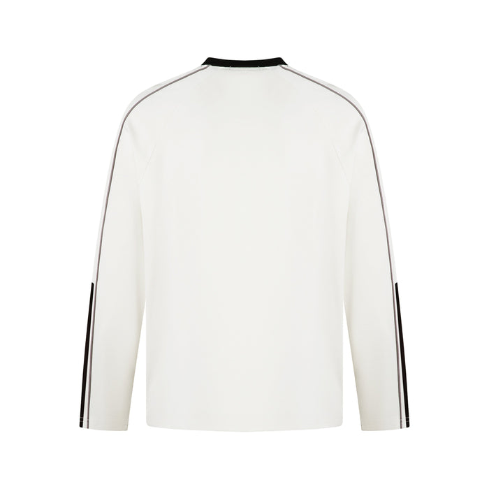 White long-sleeve raglan top with contrast piping, back view