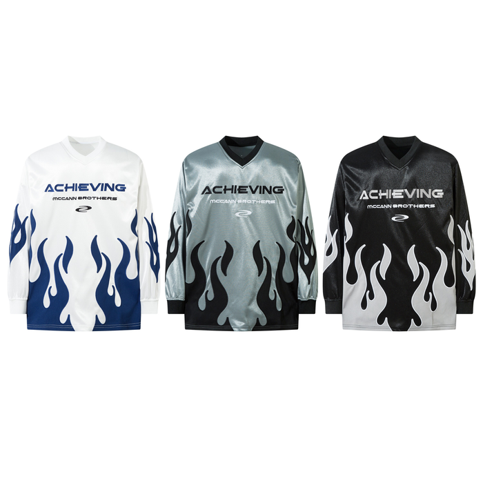 Three long sleeve jerseys shown front view in white, silver, and black colorways