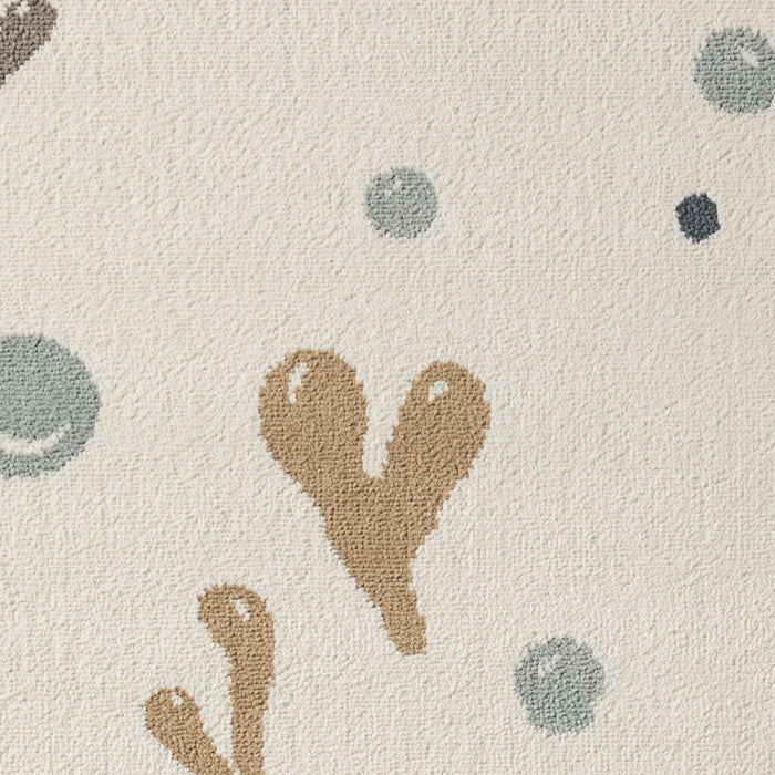 Textured fabric with abstract shapes in brown and gray on a beige background