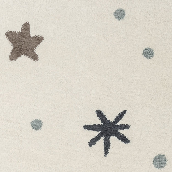 Textured fabric with star patterns in black and gray on a beige background