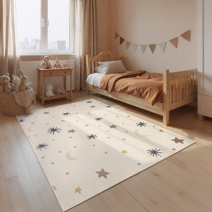 Children's bedroom with a patterned rug, bed, and toys.