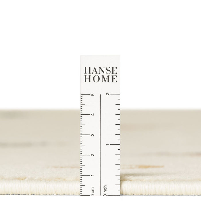 Hanse Home fabric swatch with a ruler for measurement on a white background