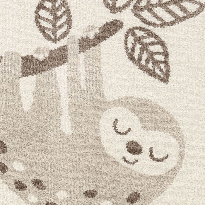 Textured fabric with a sloth design on a neutral background
