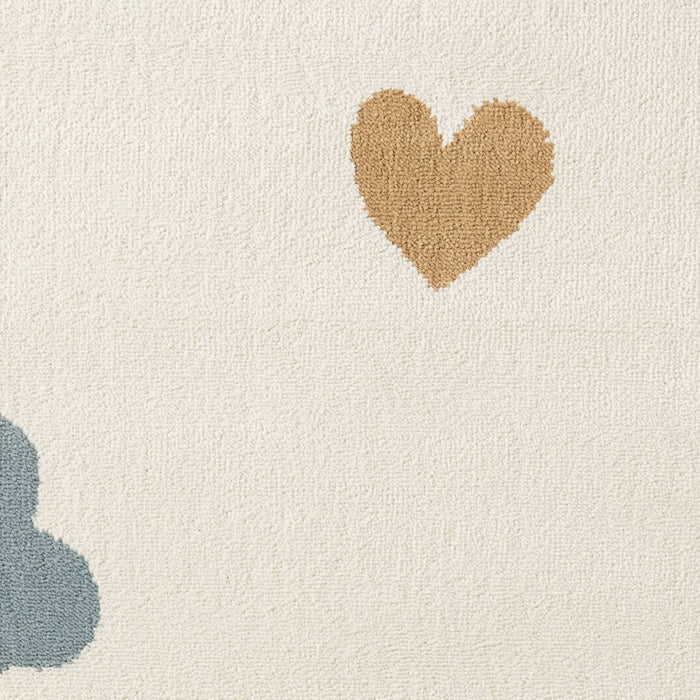 Textured beige heart shape on a light background