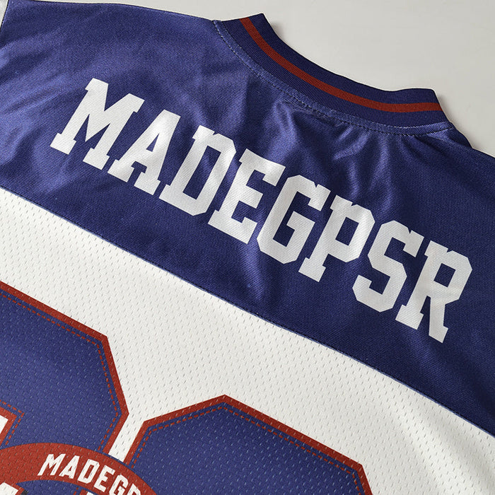 Purple and white retro football jersey with MADEGSPR lettering and varsity-style red trim