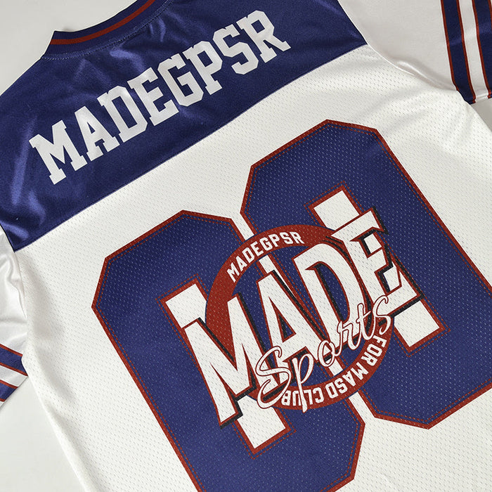 Blue and white retro football jersey with bold MADEPSR 01 graphic and varsity-style striped sleeves