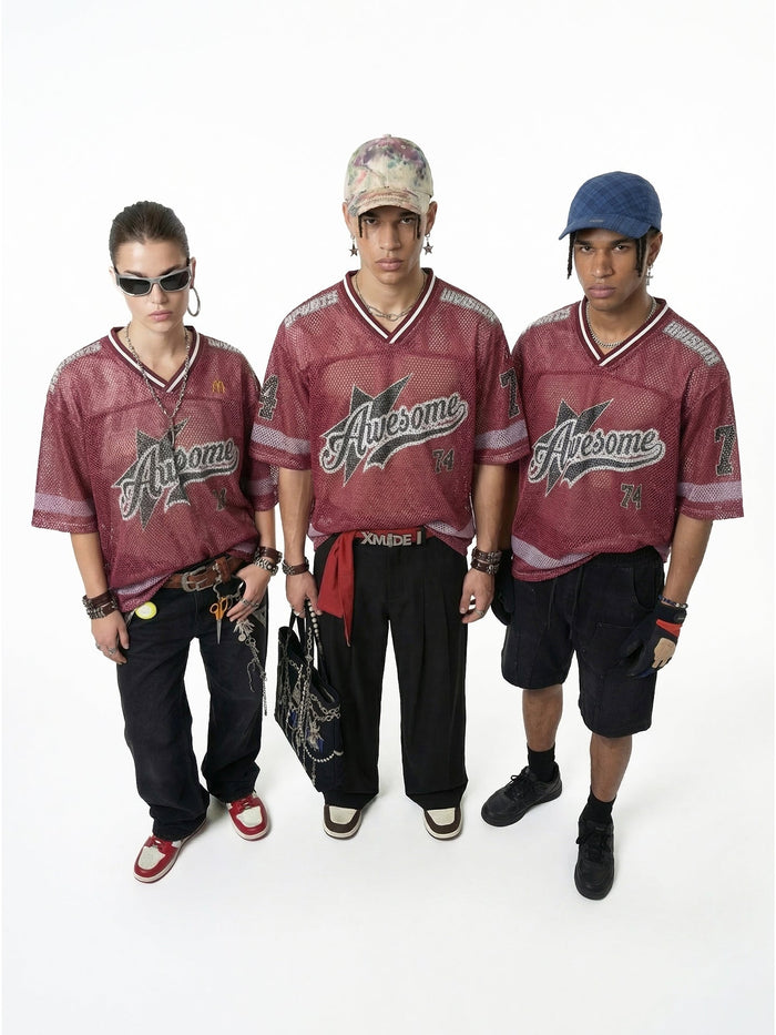Three models wear maroon mesh jersey T-shirts with Awesome 74 varsity graphics and retro streetwear styling