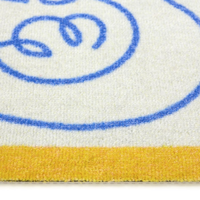 Close-up of a product with blue and yellow design on a white background