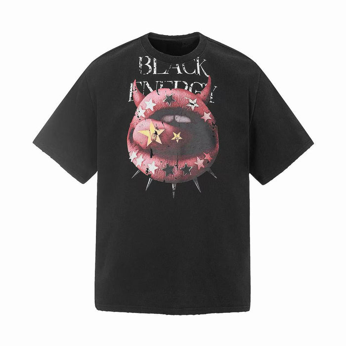 Black oversized tee with devil lips graphic, star accents, and distressed punk streetwear lettering on the chest