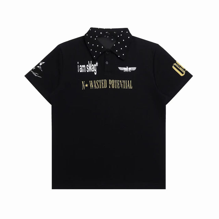 Black graphic polo shirt with studded collar, distressed chest prints, and Y2K streetwear style