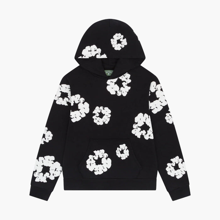 The Black “Cotton Wreath” Denim Tears Hoodie features a front pocket and an all-over white floral ring print, perfect for fans of unique streetwear styles.