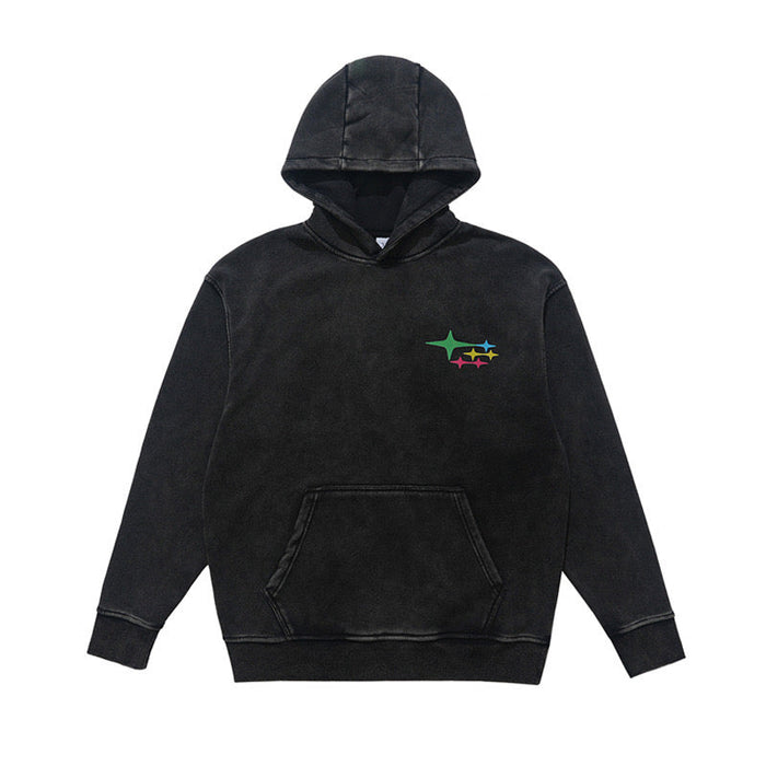 Black washed pullover hoodie front view with hood, kangaroo pocket, and small multicolor star chest print