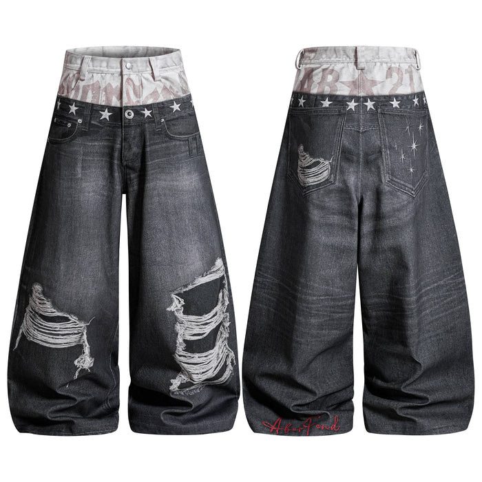 Front and back view of washed black distressed balloon jeans with camo double waistband and silver star embroidery