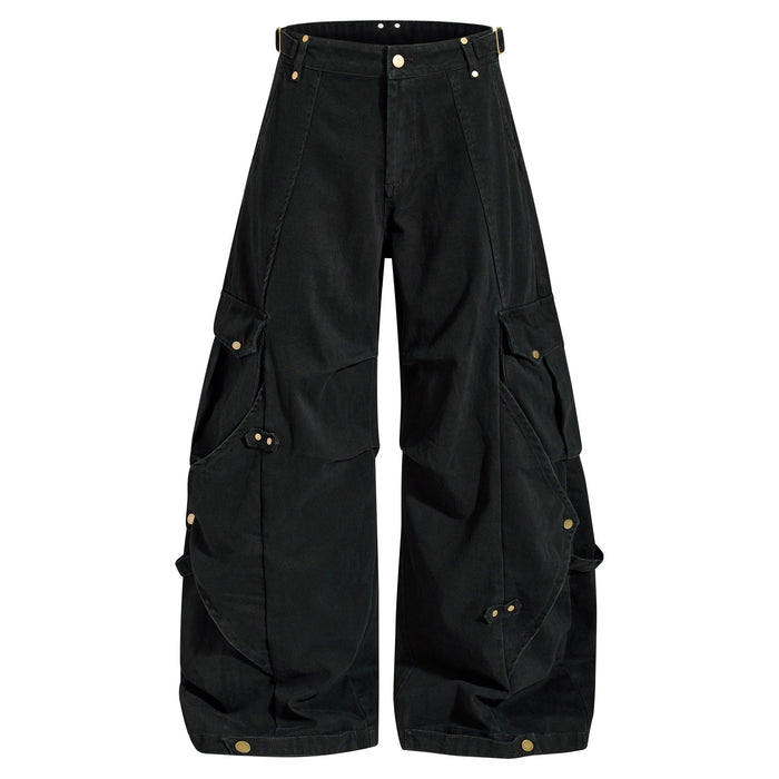 Front view of black wide-leg cargo pants with snap details and oversized leg pockets