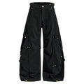 Front view of black wide-leg cargo pants with snap details and oversized leg pockets