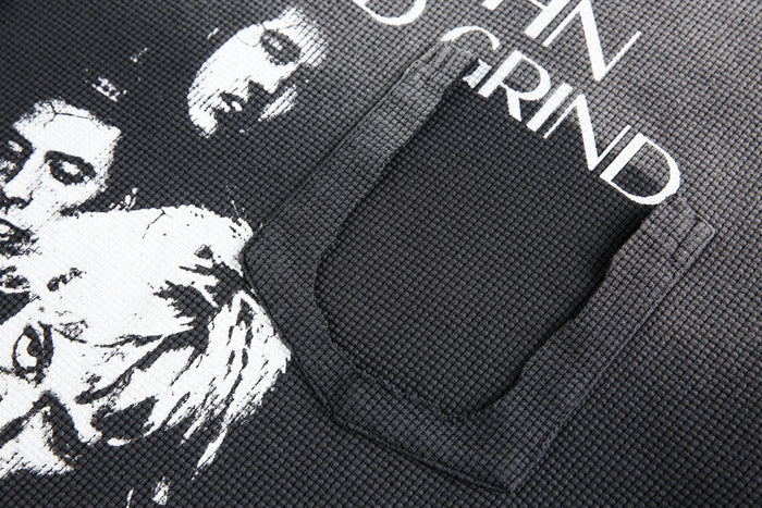 Close-up of printed faces and Rise and Grind text on black waffle knit tee