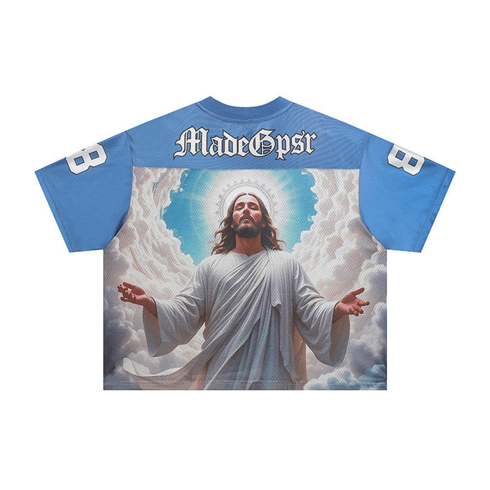 Blue football jersey with a Jesus graphic and MadeGpsr text on the back, featuring white sleeve numbers and cloudy artwork