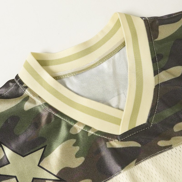 Close-up of a camouflage football jersey collar with cream ribbed trim and military star design details
