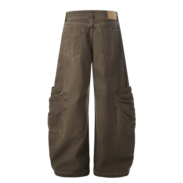 Back view of brown washed cargo pants with patch back pockets and wide legs