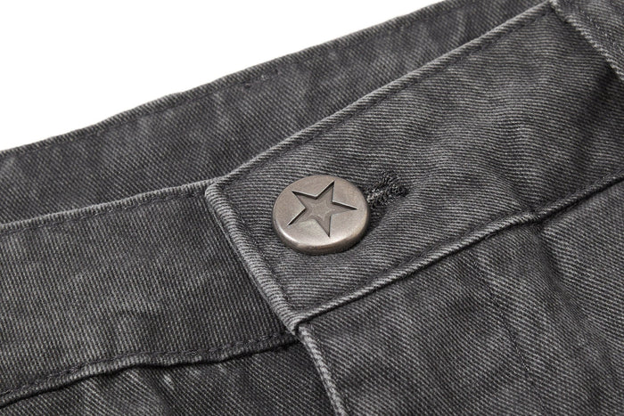 Close-up of dark gray waistband button on denim-like cargo pants