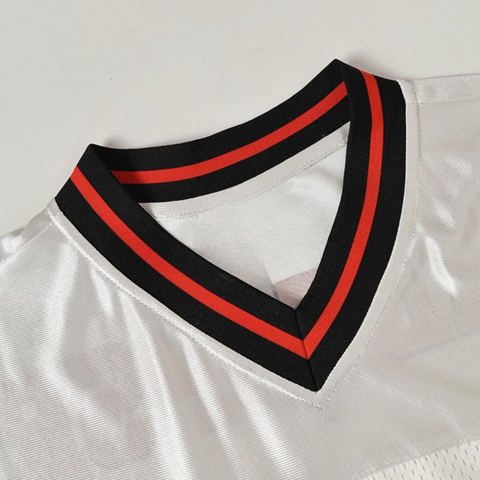 White football jersey with black and red striped V-neck collar, shown in a close-up detail shot