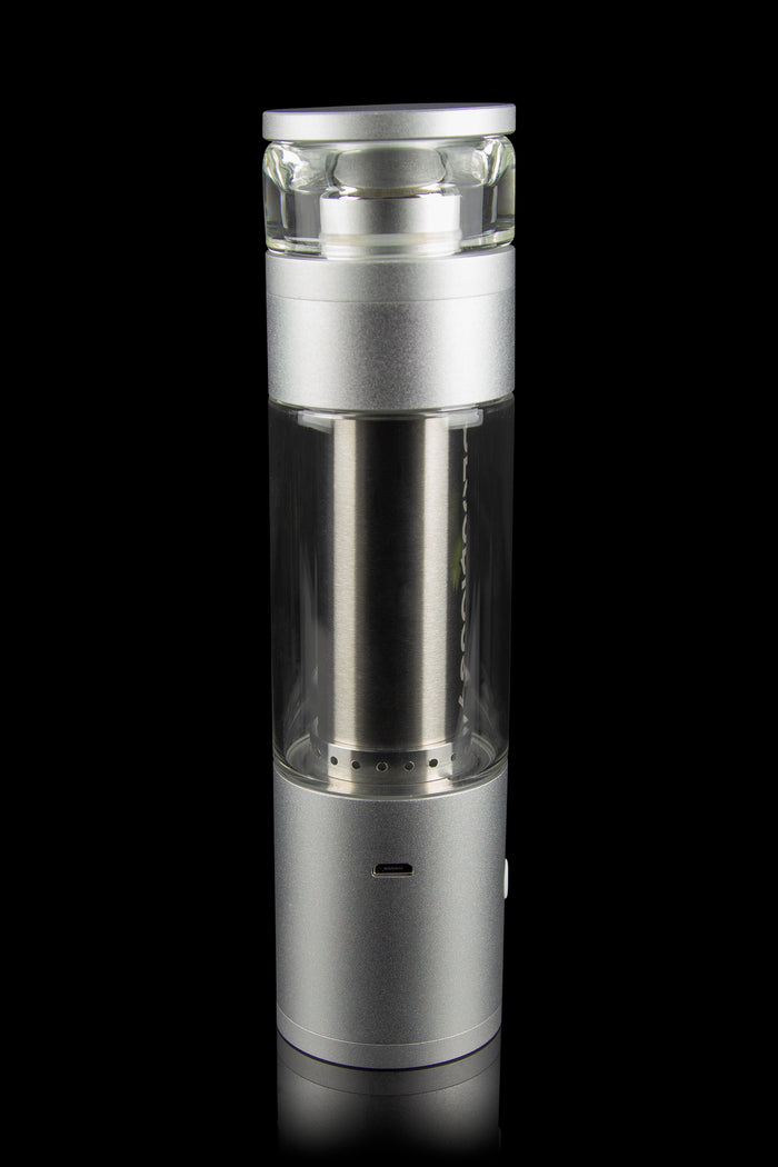 Silver cannabis e-rig with glass bubbler, studio shot on black.