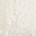 Close-up of CO-6 Supernova glaze, creamy white surface with iridescent frost-like crystal patterns
