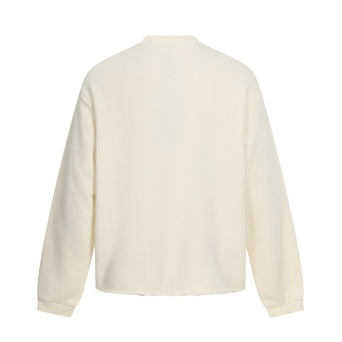 Back view of cream sweatshirt showing textured fabric and ribbed collar