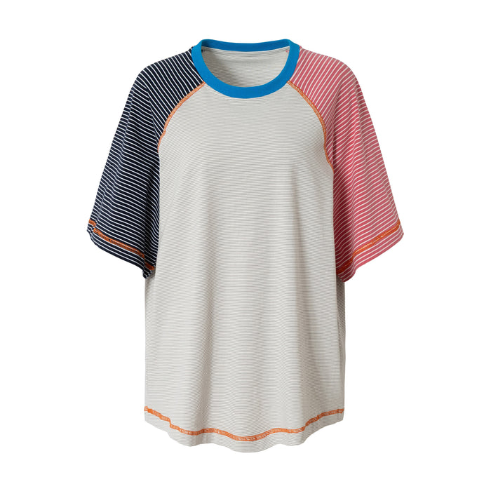 Relaxed fit raglan T-shirt with blue collar, striped color block sleeves, and cream body on white background