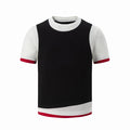 Black colorblock raglan T-shirt with white sleeves, red trim, and a curved layered hem on a white background