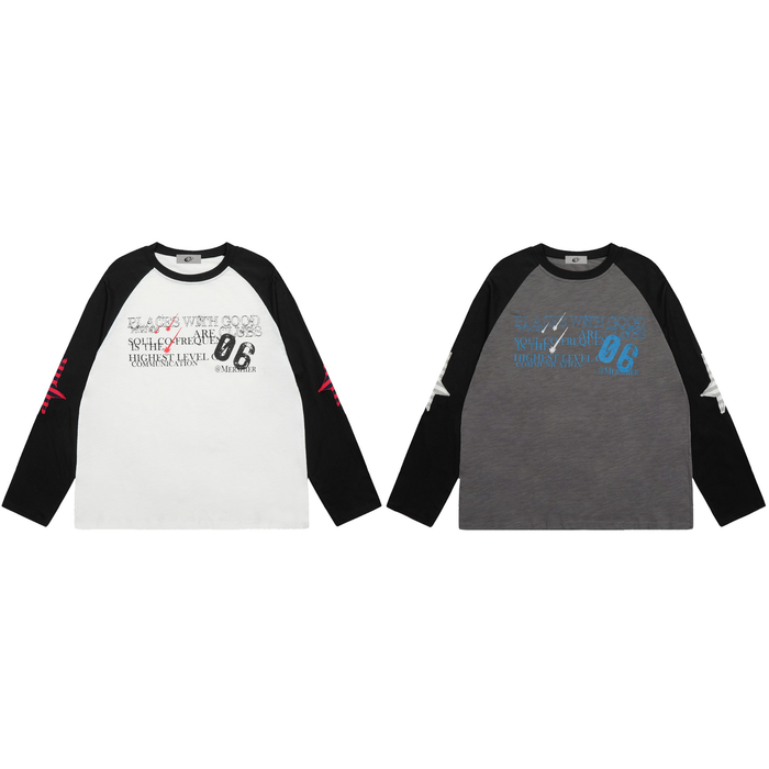 White and black contrast raglan long-sleeve tee with layered typographic chest print and red sleeve graphics, flat lay front