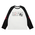 White raglan long-sleeve tee with black sleeves and front graphic text