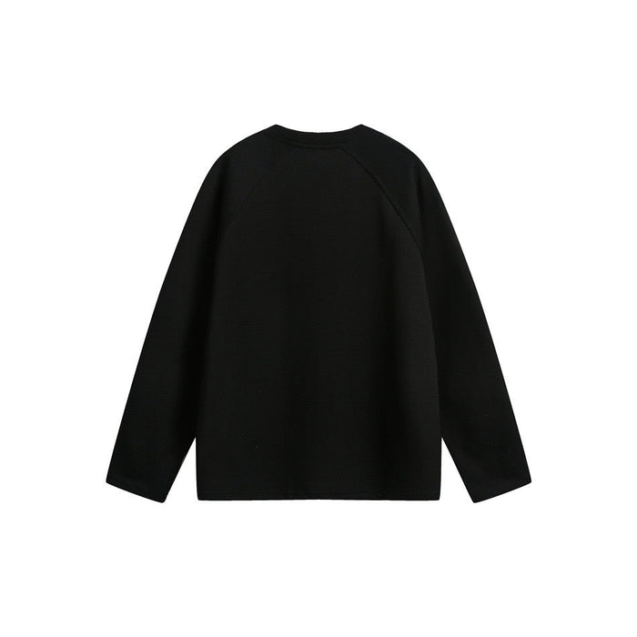 Plain black back view of the long sleeve tee