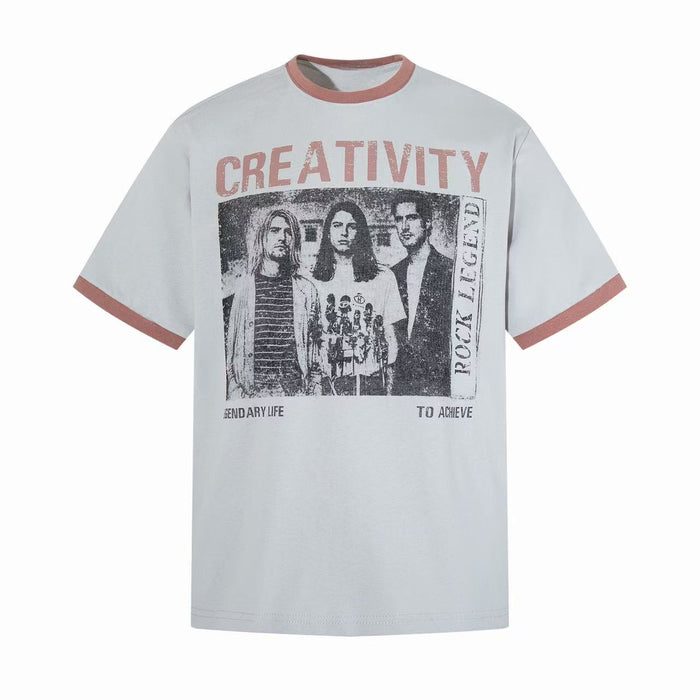Light gray ringer T-shirt with pink trim and vintage band graphic featuring the word Creativity on the front