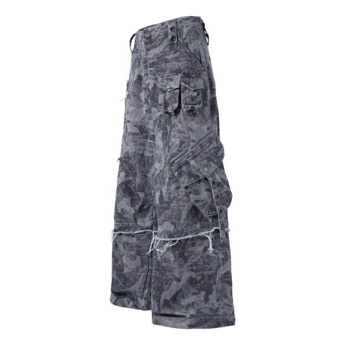 Gray distressed camo cargo pants angled front view with flap pockets