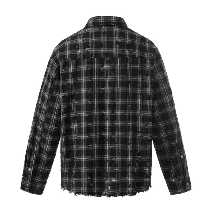 Back view of black plaid flannel overshirt with distressed weave and frayed edges