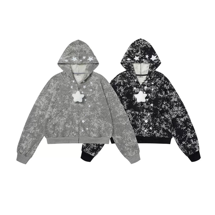 Grey cropped zip hoodie with white starburst splatter print, fleece lining, and detachable plush star charm on zipper