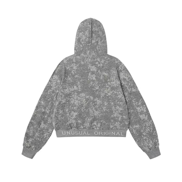 Back view of gray starburst zip hoodie with hood and ribbed hem