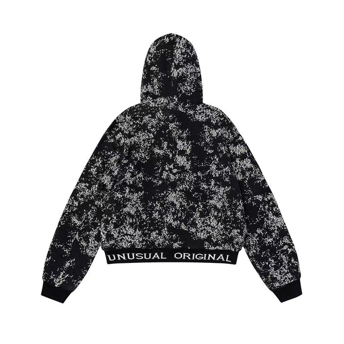 Back view of black starburst zip hoodie with ribbed hem