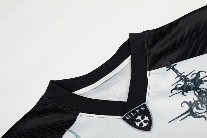 Black and white gothic mesh football jersey with dark graphic print and ribbed collar detail