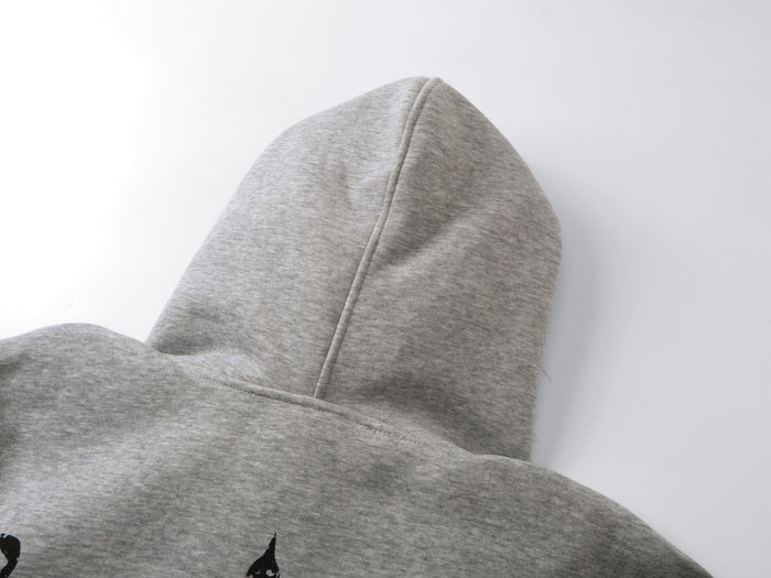 Close-up of gray hood with center seam and heathered knit texture
