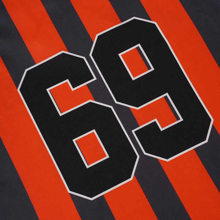 Black and orange striped football jersey with large number 69 on the front