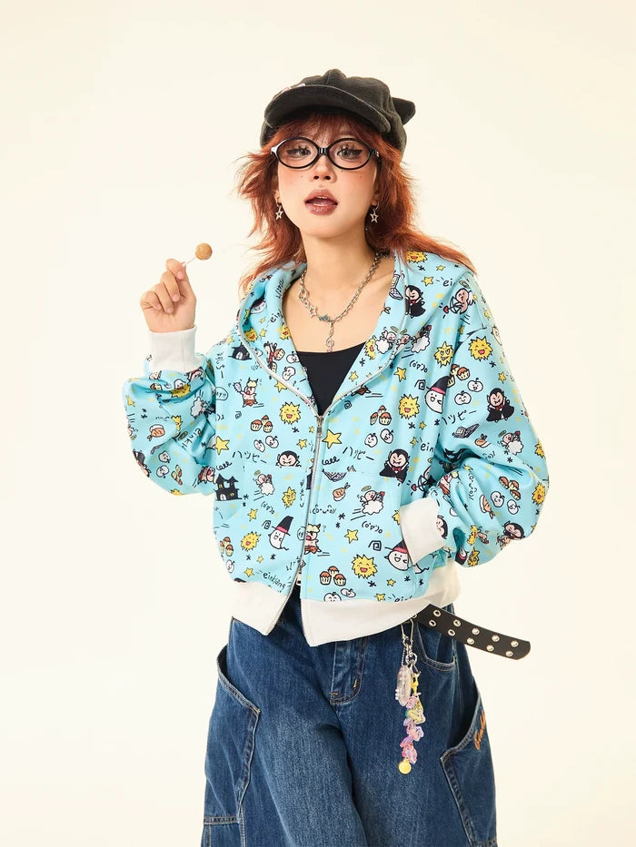 A red-haired person sports a black cap, round glasses, wide-leg jeans, and a whimsical streetwear look featuring Seakoff's Kawaii Cartoon Bear Hoodie with adorable ears. Playful accessories dangle from their belt while they hold a lollipop in one hand.