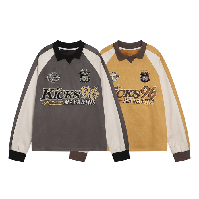 Charcoal and mustard varsity rugby tops with Kicks 96 embroidered lettering and contrast raglan sleeves