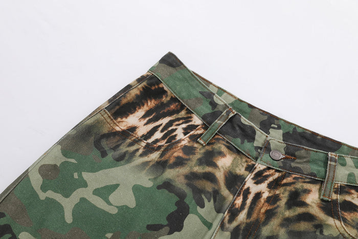 Close-up of the waistband, belt loop, button, and front pocket on camouflage leopard cargo pants