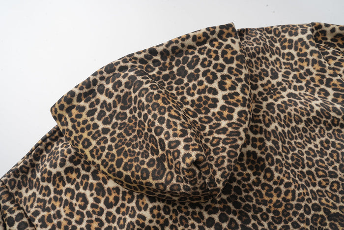 Leopard print hoodie hood detail with gathered seams and soft fabric texture