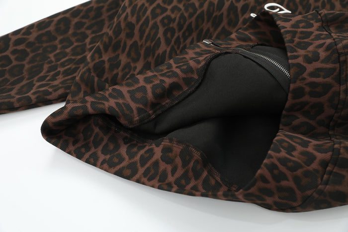 Hood lining close-up showing brown leopard print exterior and black interior