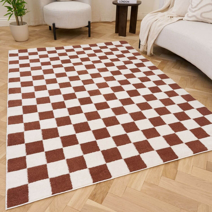 Living room with a checkered rug, beige sofa, and ideal for high traffic areas