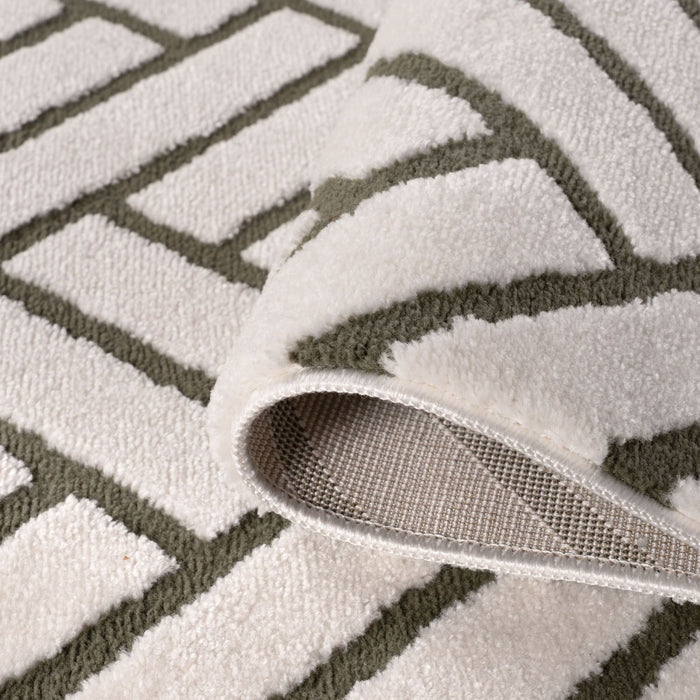 Close-up of a textured rug with geometric pattern
