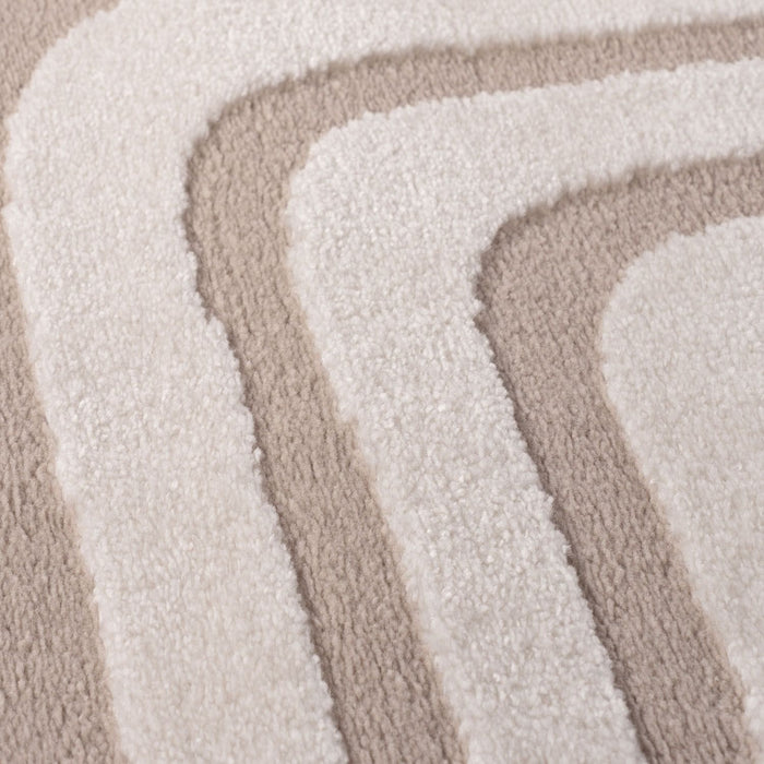Close-up of beige and white textured rug swatches